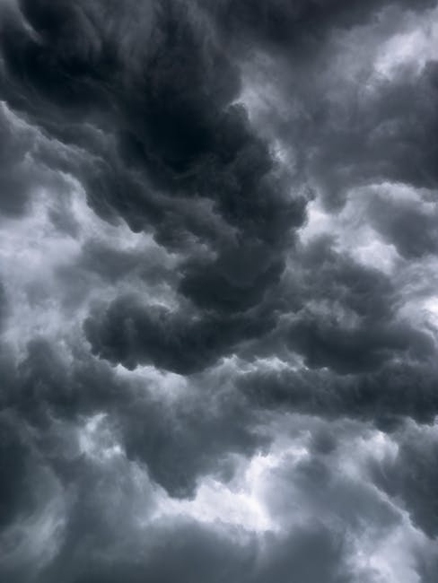 A moody sky filled with dramatic storm clouds, showcasing nature's power.